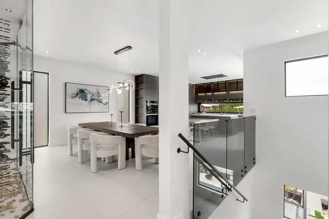 a kitchen with a sink and wooden cabinets