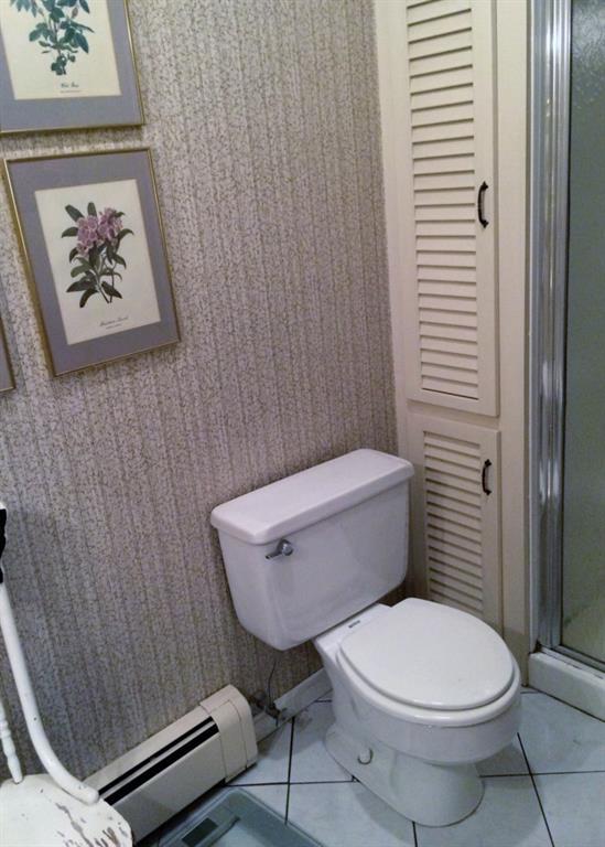 27 Maplewood Road Lewiston, ME 04240 - Photo 20 of 30 Master bathroom offers storage and a...