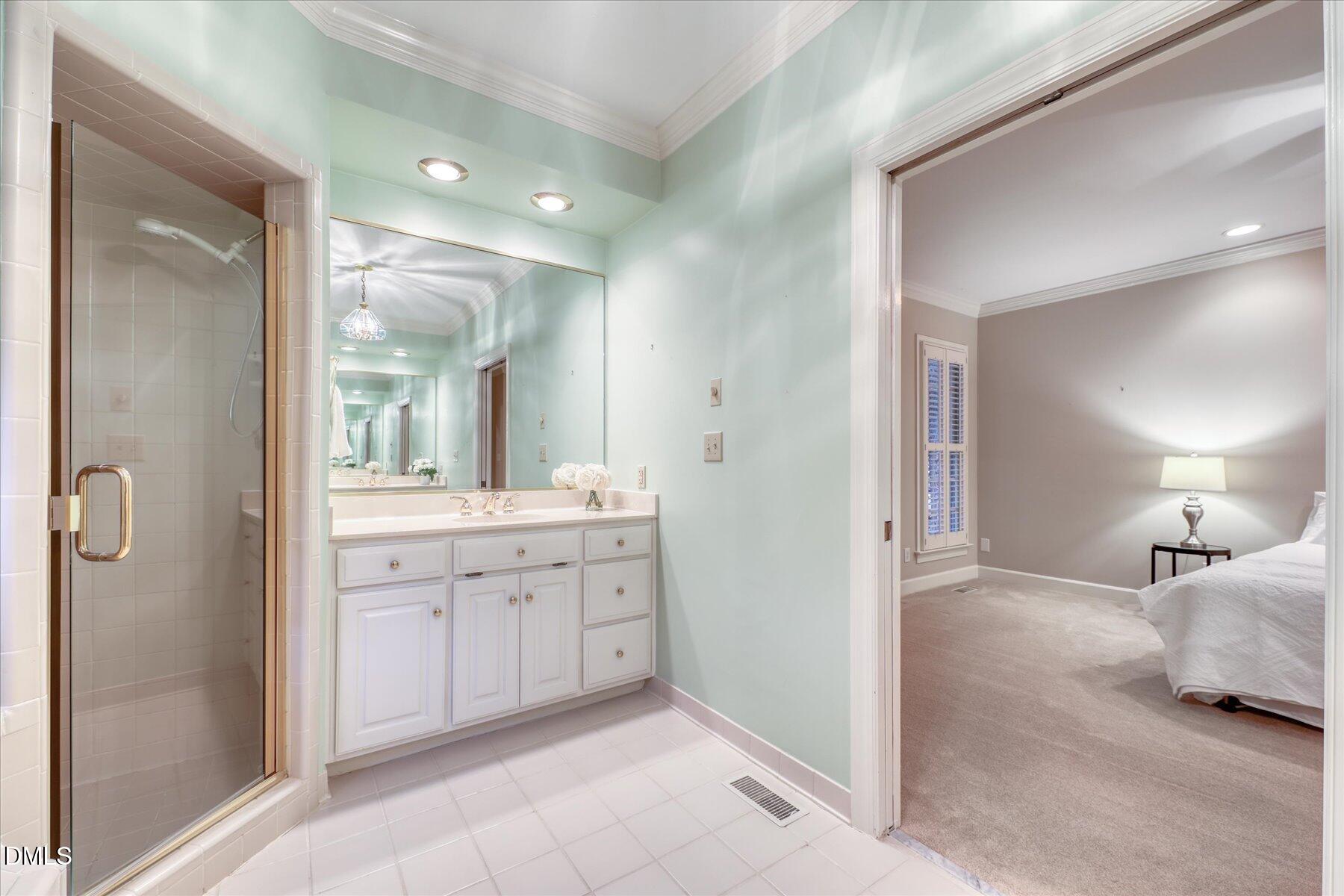 1904 Merion Place Raleigh, NC 27615 - Photo 20 of 43 Primary bathroom with separate dual vanities