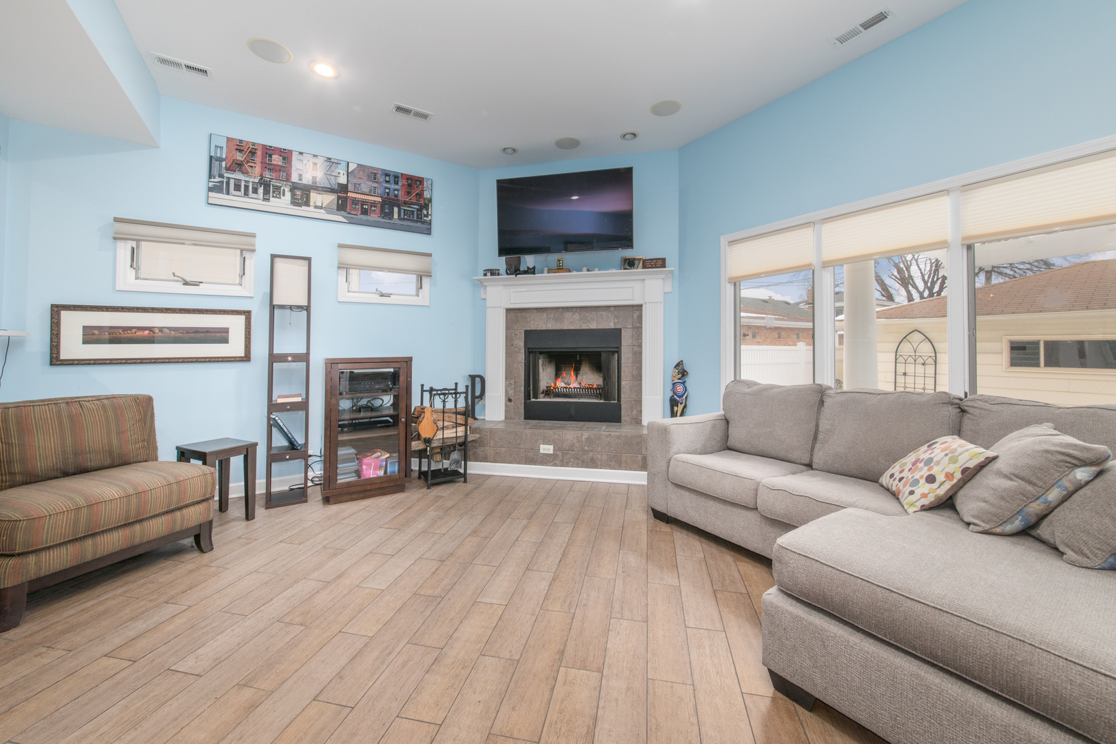 7417 North Oleander Avenue Chicago, IL 60631 - Photo 13 of 28 a living room with furniture and a fireplace