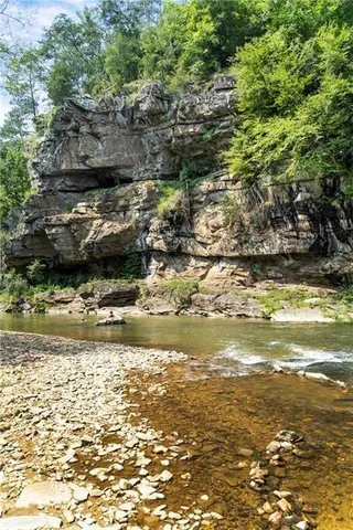 a view of a house with backyard