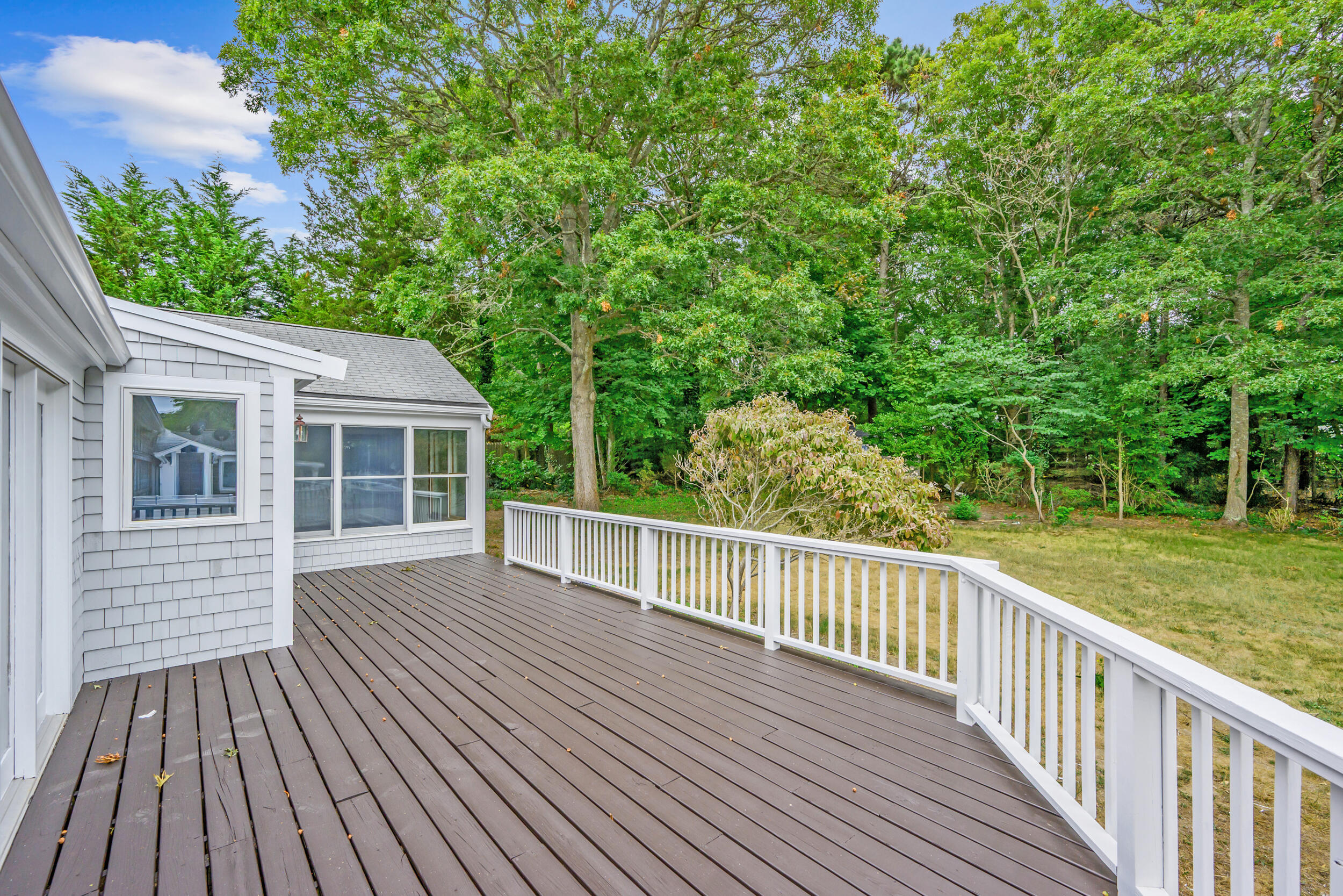 296 Buckskin Path Centerville, MA 02632 - Photo 23 of 34 a view of deck with trees