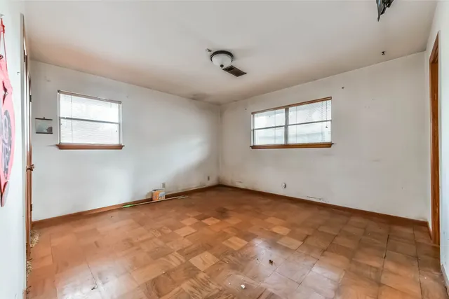 an empty room with windows