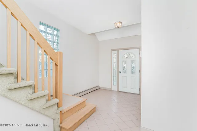 a view of an entryway with staircase