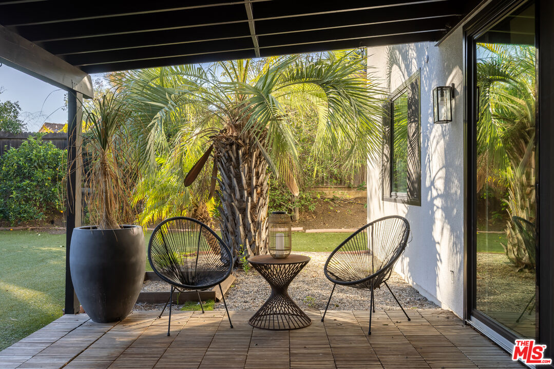 18404 Arminta Street Reseda, CA 91335 - Photo 32 of 33 a view of a chairs in balcony