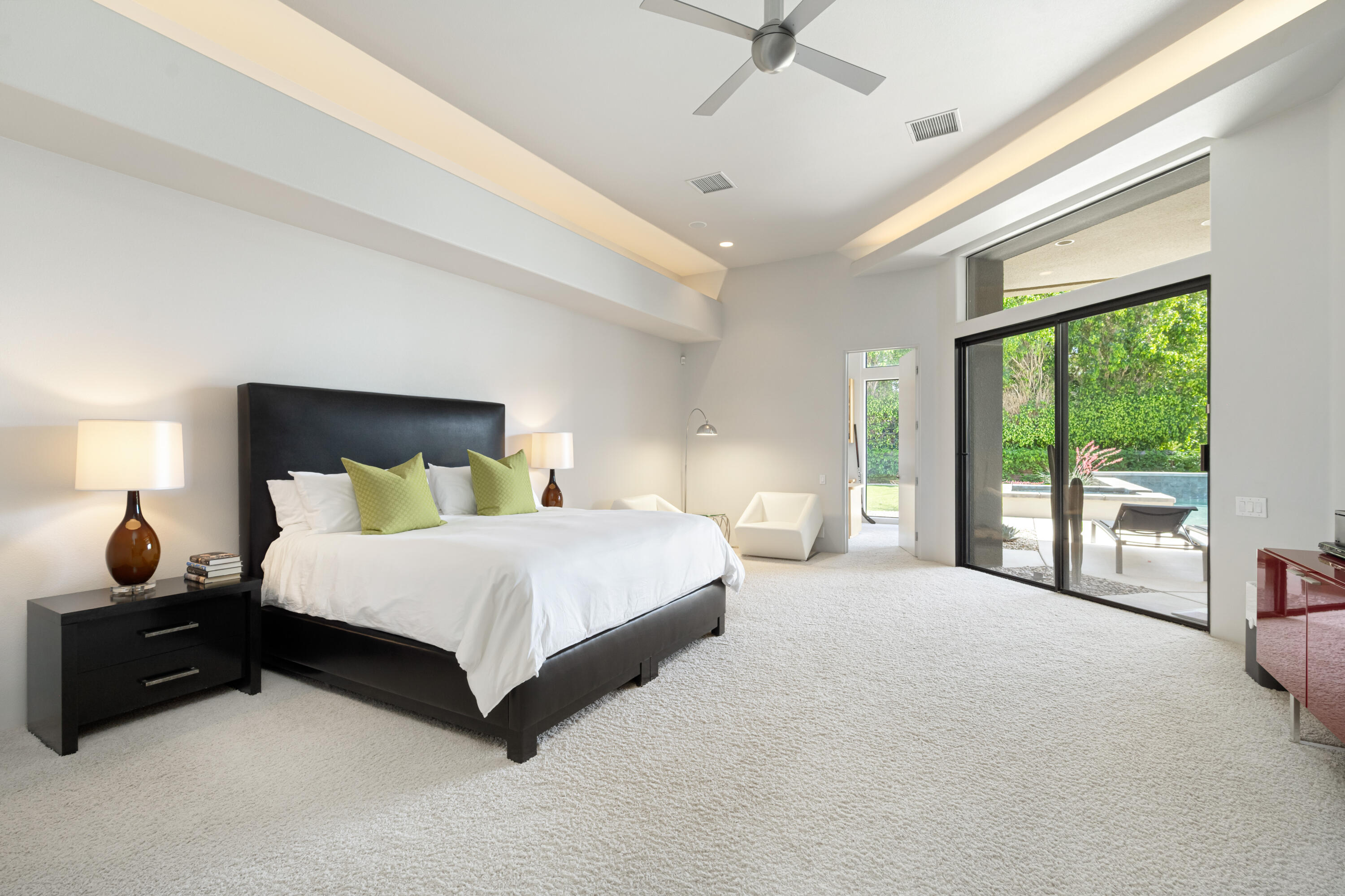 18 Boulder Lane Rancho Mirage, CA 92270 - Photo 16 of 41 a spacious bedroom with a bed and large window