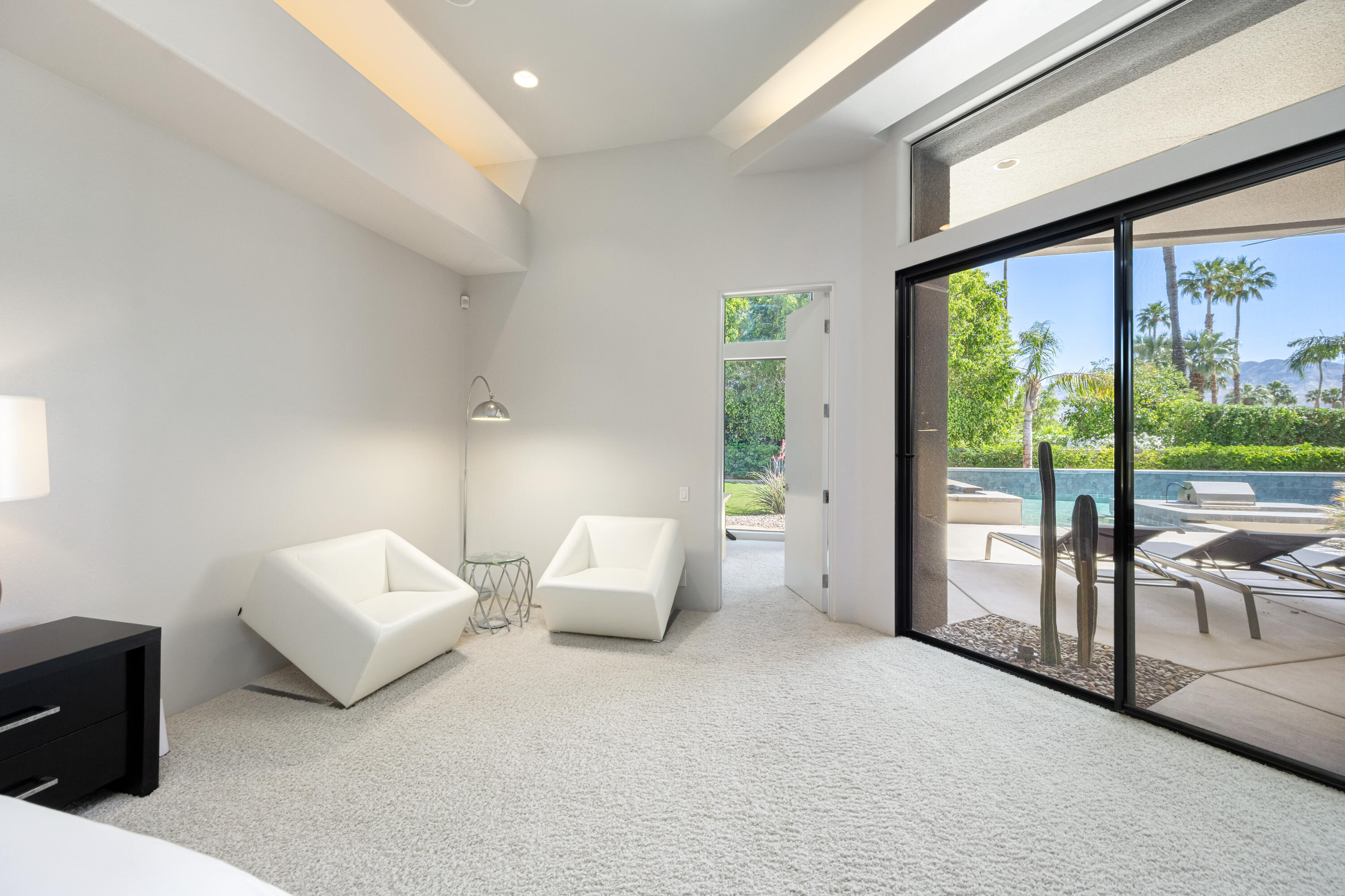 18 Boulder Lane Rancho Mirage, CA 92270 - Photo 18 of 41 a living room with furniture and a large window