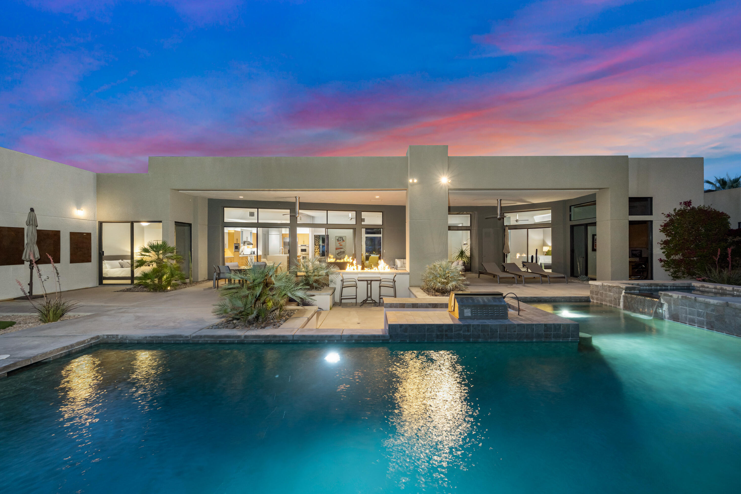 18 Boulder Lane Rancho Mirage, CA 92270 - Photo 2 of 41 a view of a swimming pool with outdoor seating