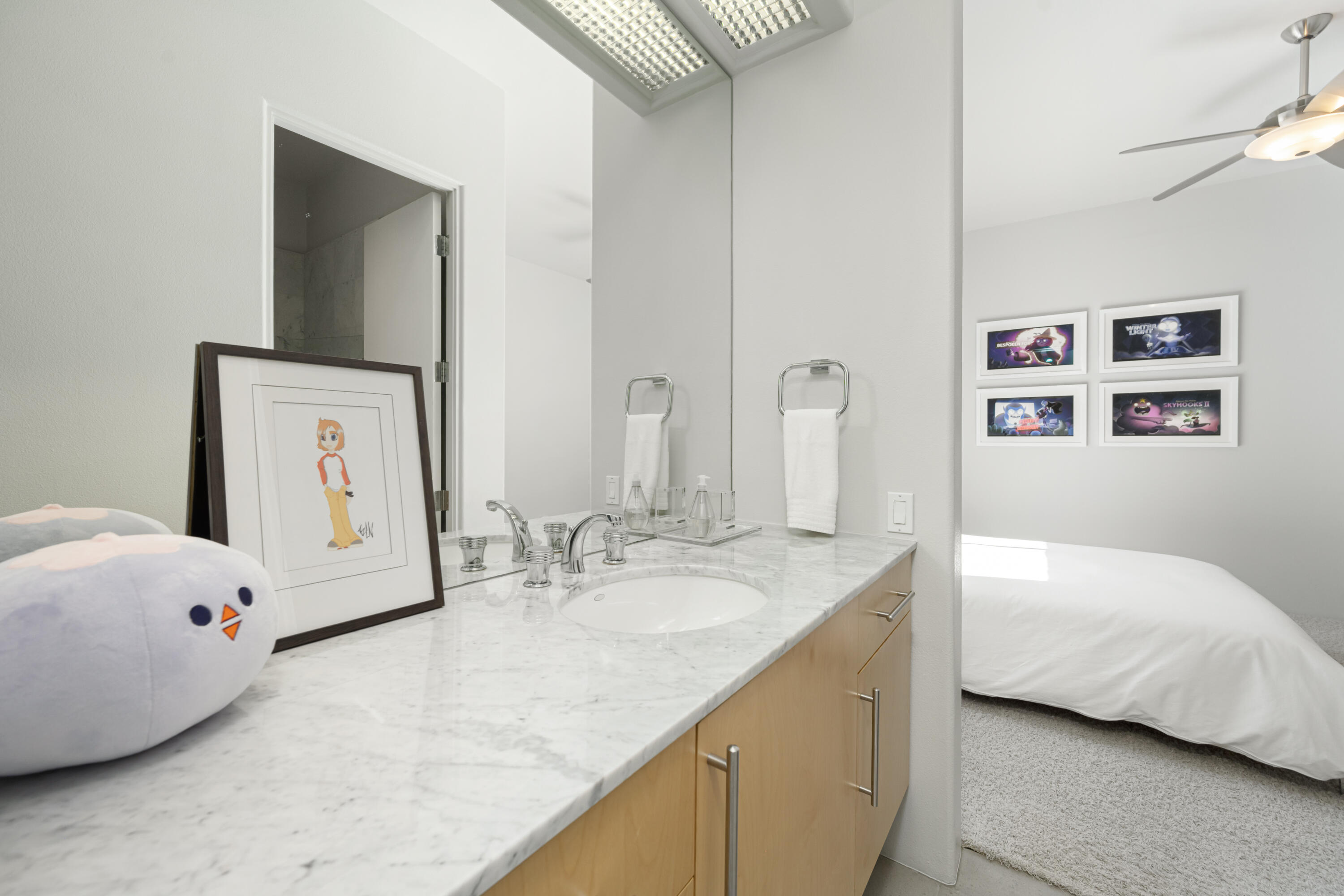 18 Boulder Lane Rancho Mirage, CA 92270 - Photo 25 of 41 a bedroom with a bed and a cabinets