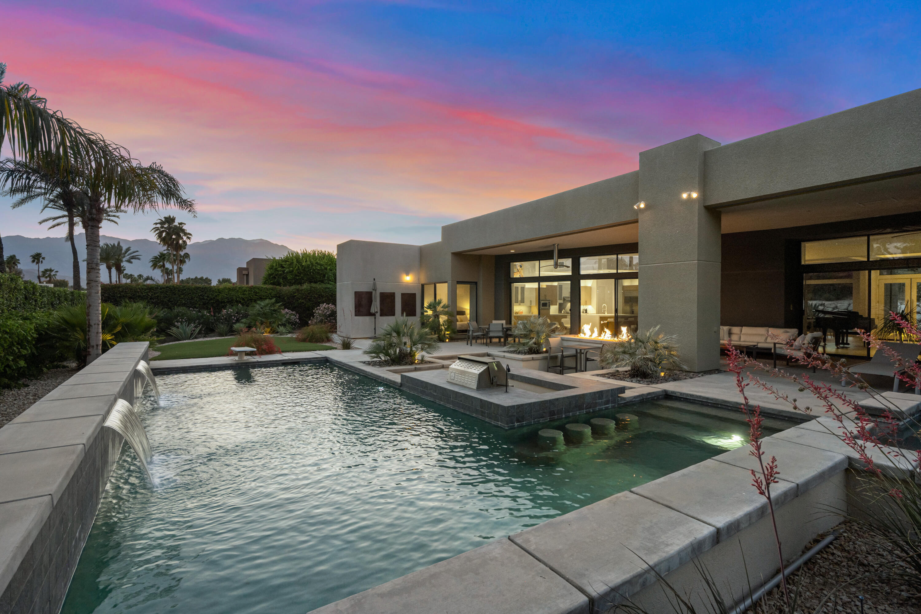 18 Boulder Lane Rancho Mirage, CA 92270 - Photo 35 of 41 a view of a house with swimming pool and sitting area
