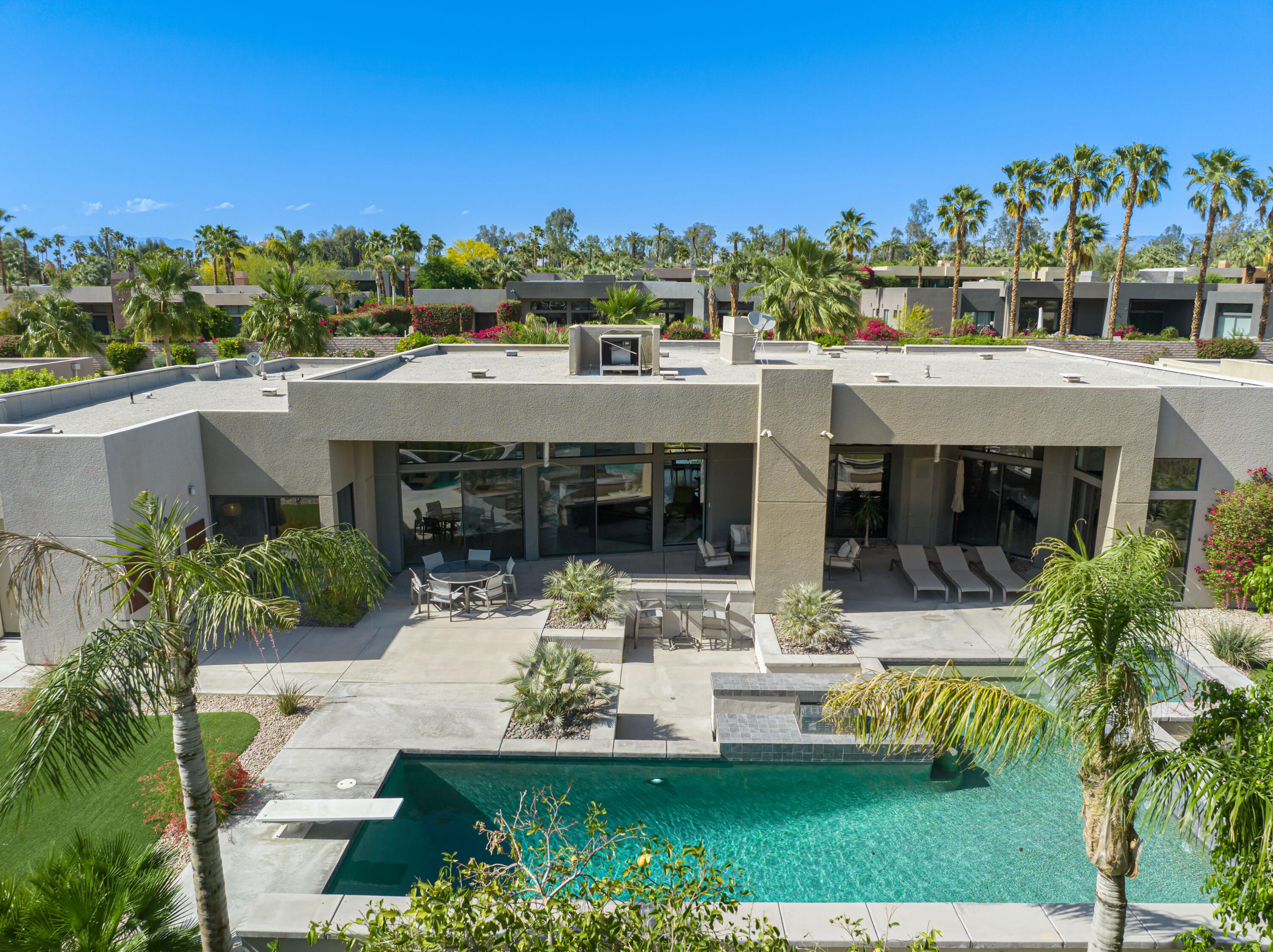 18 Boulder Lane Rancho Mirage, CA 92270 - Photo 37 of 41 a front view of house with yard and outdoor seating