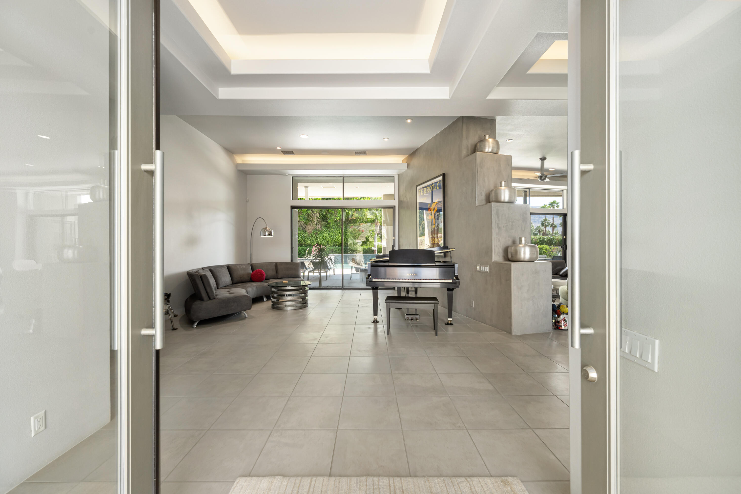 18 Boulder Lane Rancho Mirage, CA 92270 - Photo 7 of 41 a living room with furniture and a large window