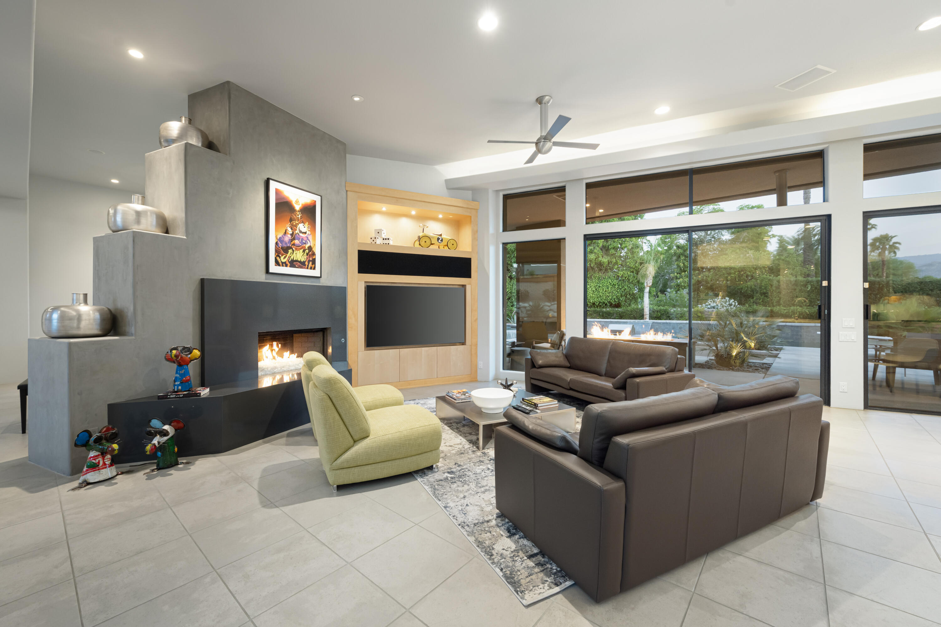 18 Boulder Lane Rancho Mirage, CA 92270 - Photo 10 of 41 a living room with furniture and a fireplace