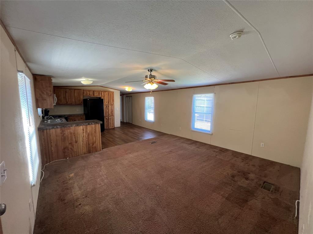 1647 Stonecrest Road Argyle, TX 76226 - Photo 10 of 16 a view of a kitchen with a sink