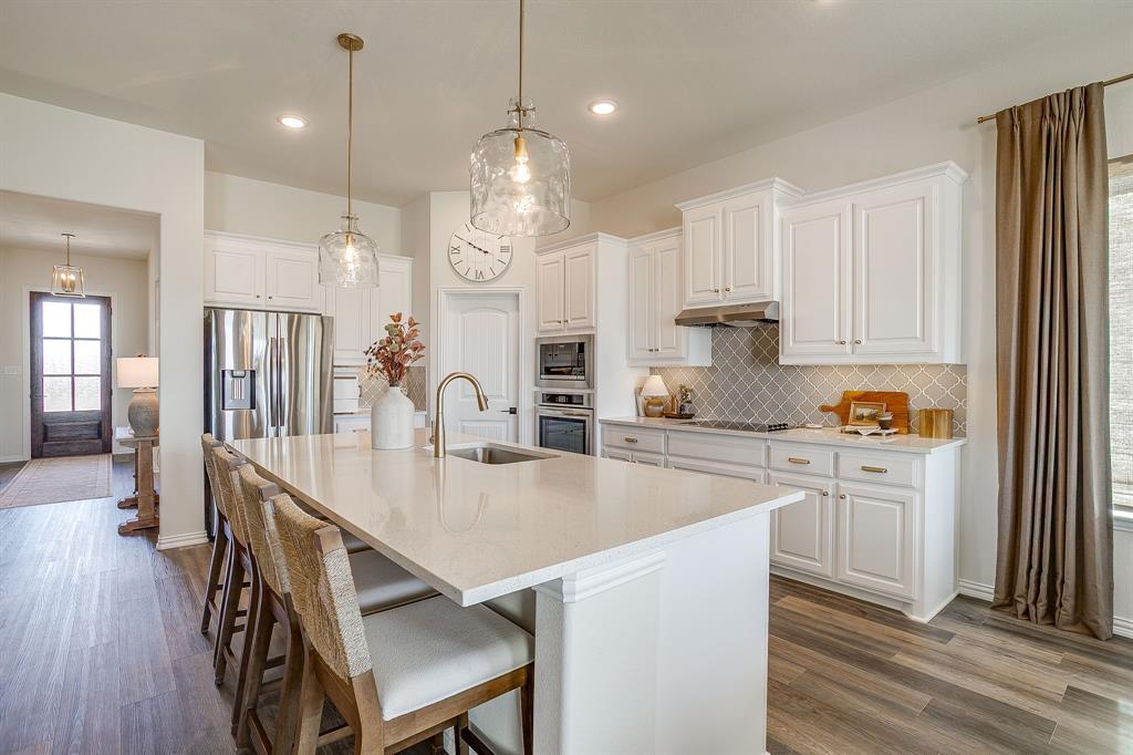 445 Guadalupe Lane Springtown, TX 76082 - Photo 13 of 40 Kitchen with large island