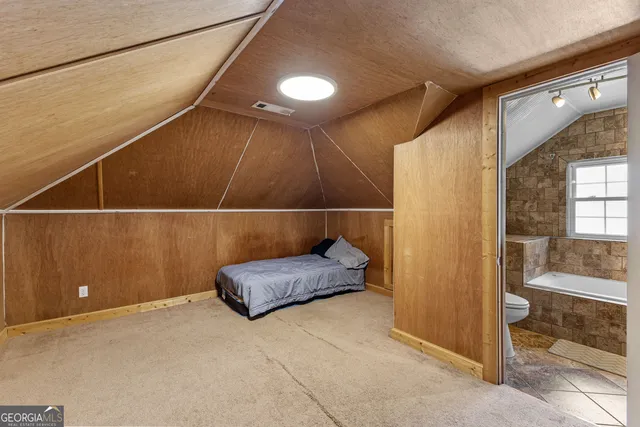 a view of a swimming pool with a yard