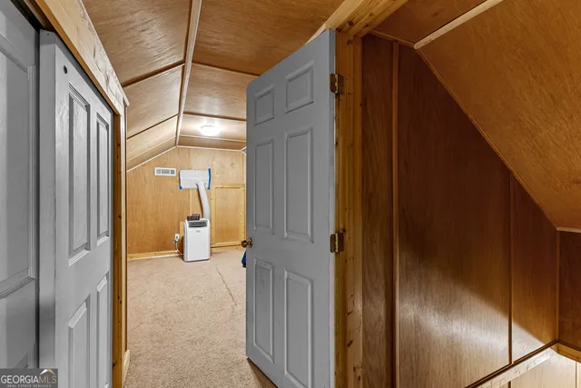 a view of house with backyard and garden