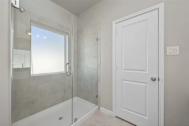 a bathroom with a sink and a yard