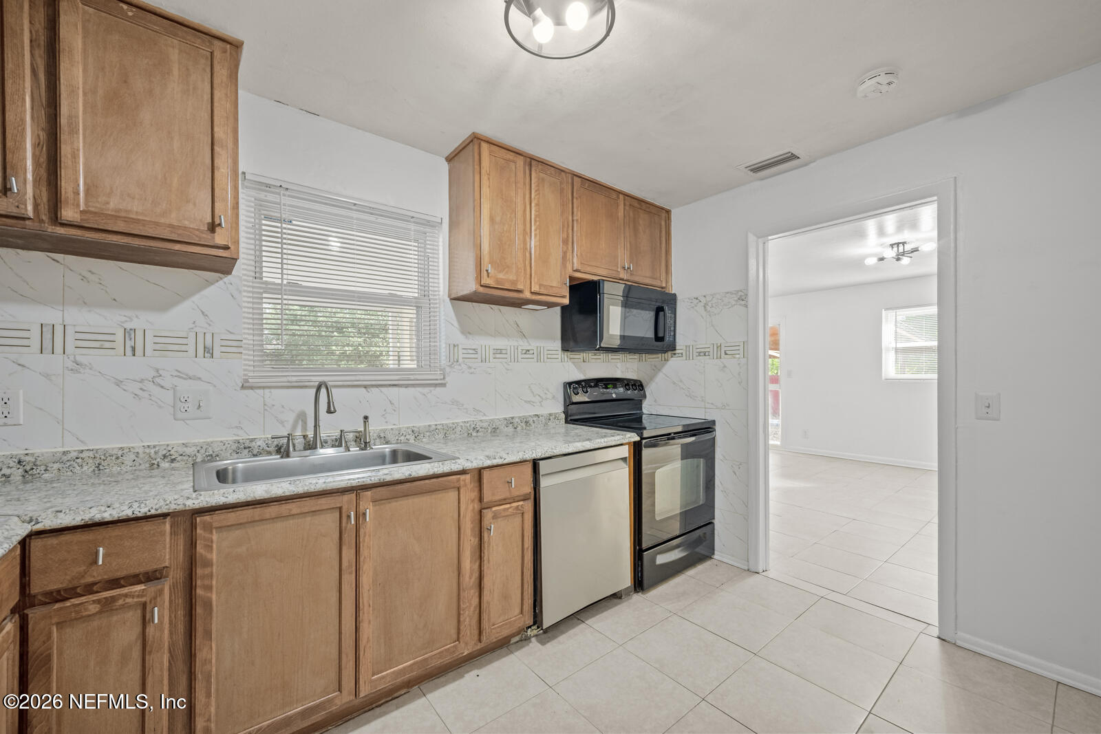 3509 Rogero Road Jacksonville, FL 32277 - Photo 9 of 23 3509 Rogero Rd_32277-12