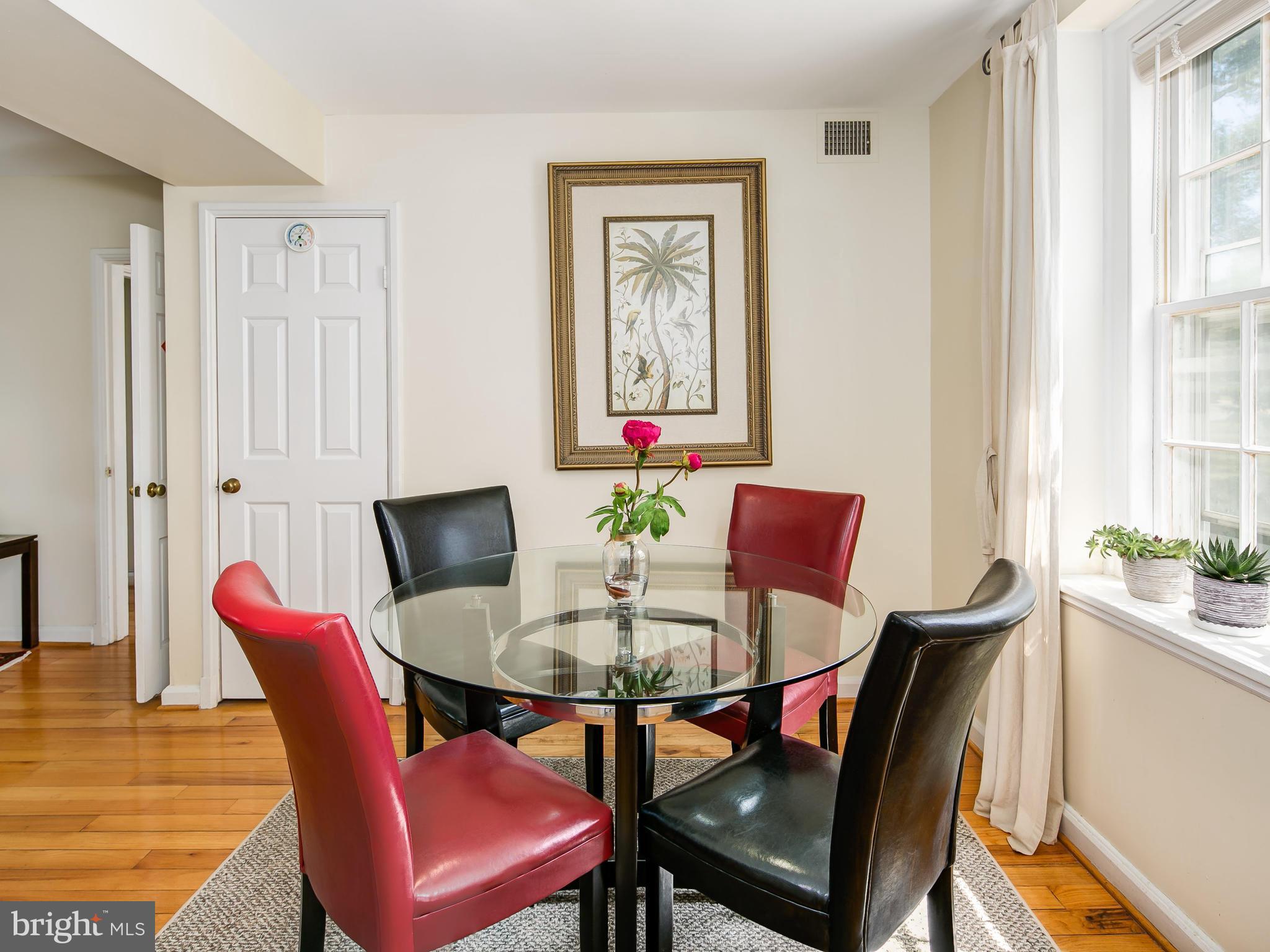 3851 Porter Street Northwest, Unit D280 Washington, DC 20016 - Photo 12 of 22 a dining room with furniture and window
