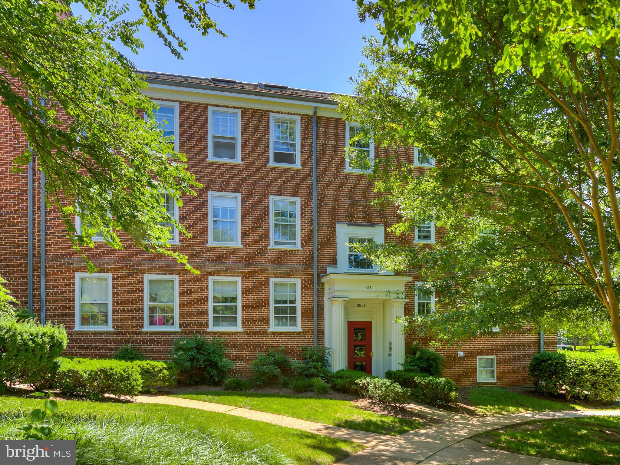 3851 Porter Street Northwest, Unit D280 Washington, DC 20016 - Photo 21 of 22 a front view of a house with garden