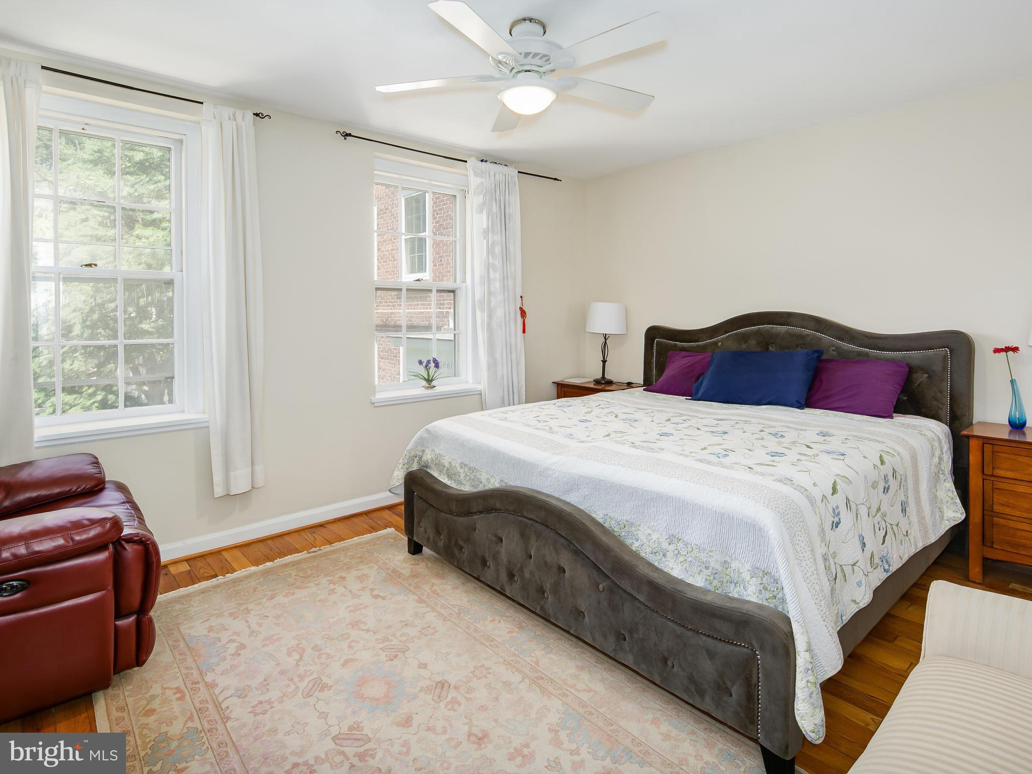 3851 Porter Street Northwest, Unit D280 Washington, DC 20016 - Photo 5 of 22 a spacious bedroom with a bed and window
