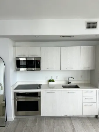 a bathroom with a toilet and a bathtub