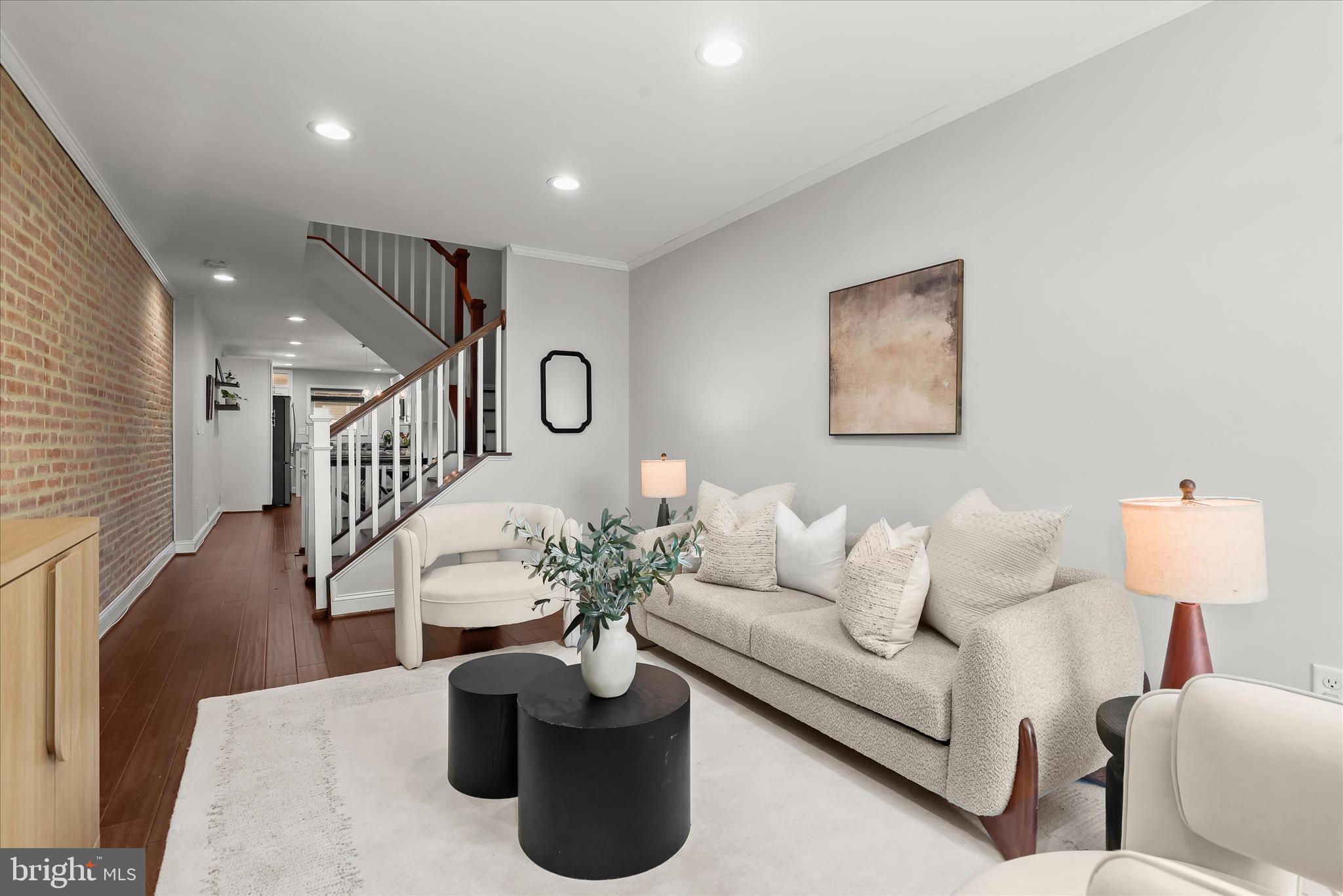 a living room with furniture and a table