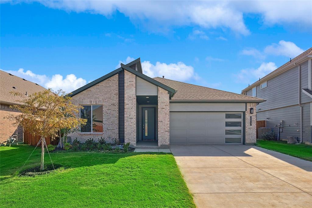 2217 Yellowhammer Road Denton, TX 76205 - Photo 1 of 30 a view of a house with a yard