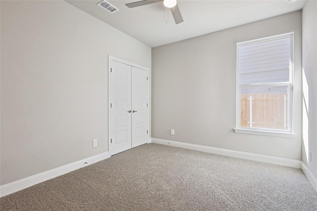 2217 Yellowhammer Road Denton, TX 76205 - Photo 11 of 30 an empty room with windows