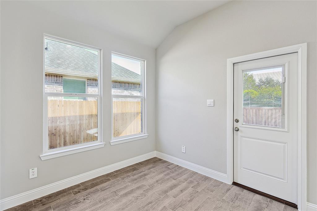 2217 Yellowhammer Road Denton, TX 76205 - Photo 17 of 30 an empty room with windows