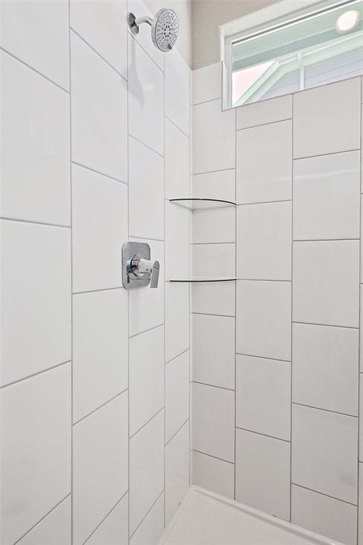 2217 Yellowhammer Road Denton, TX 76205 - Photo 25 of 30 a bathroom with a shower