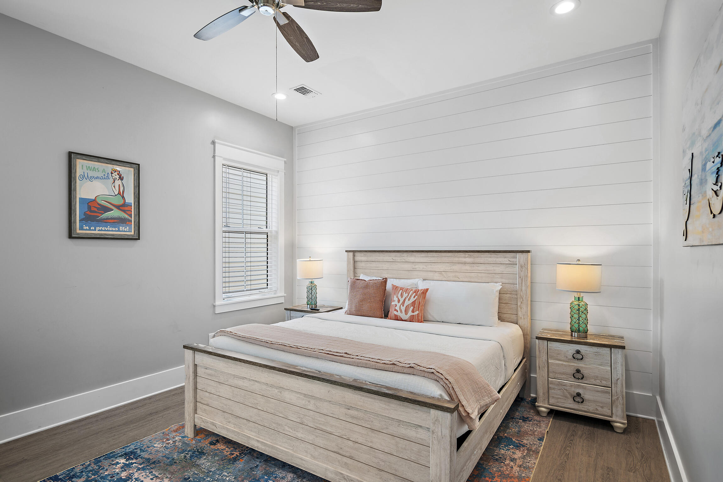 459 Dolphin Drive Santa Rosa Beach, FL 32459 - Photo 14 of 31 a bedroom with a bed and a chandelier