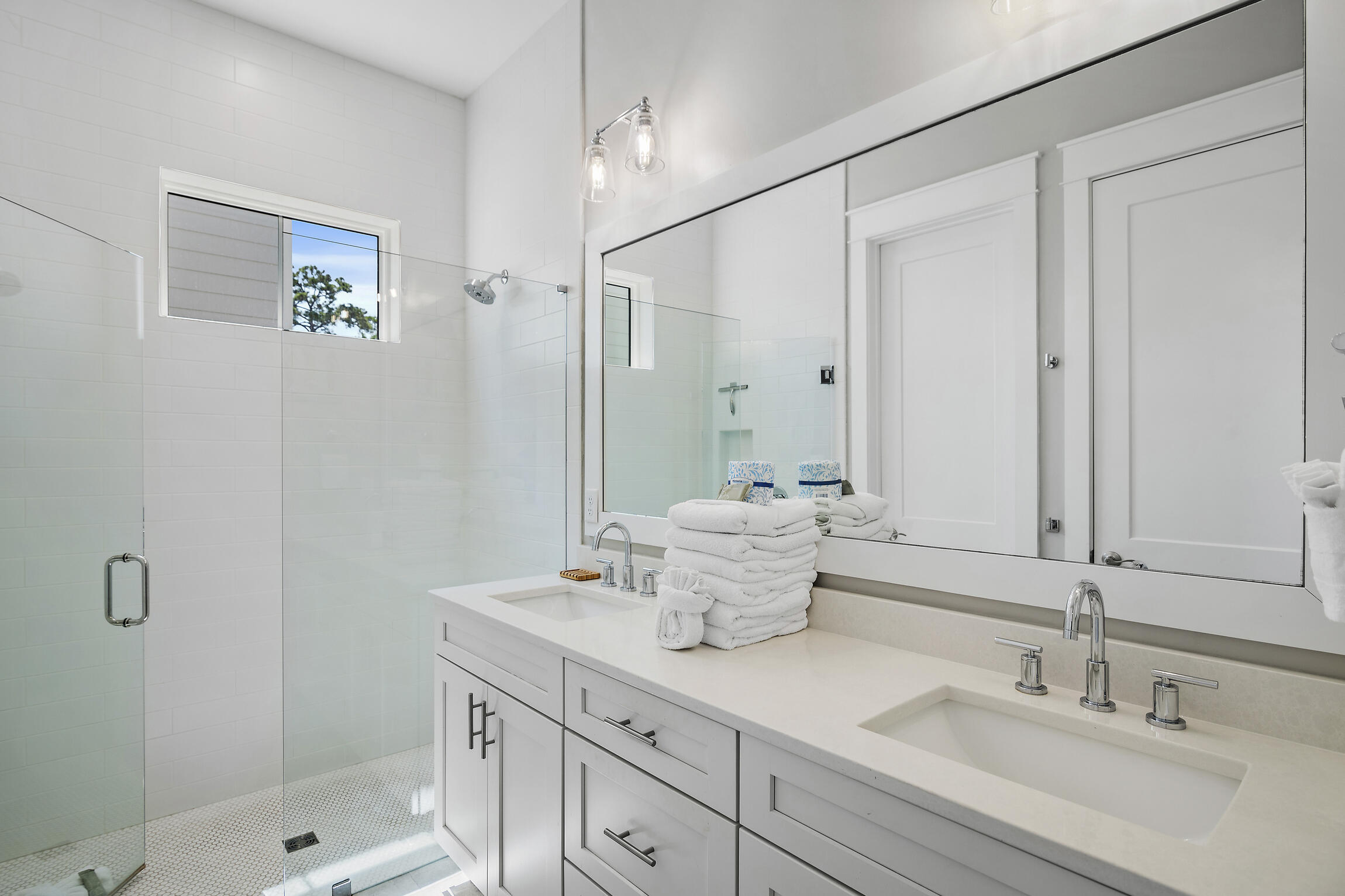 459 Dolphin Drive Santa Rosa Beach, FL 32459 - Photo 17 of 31 a bathroom with double sink and a mirror