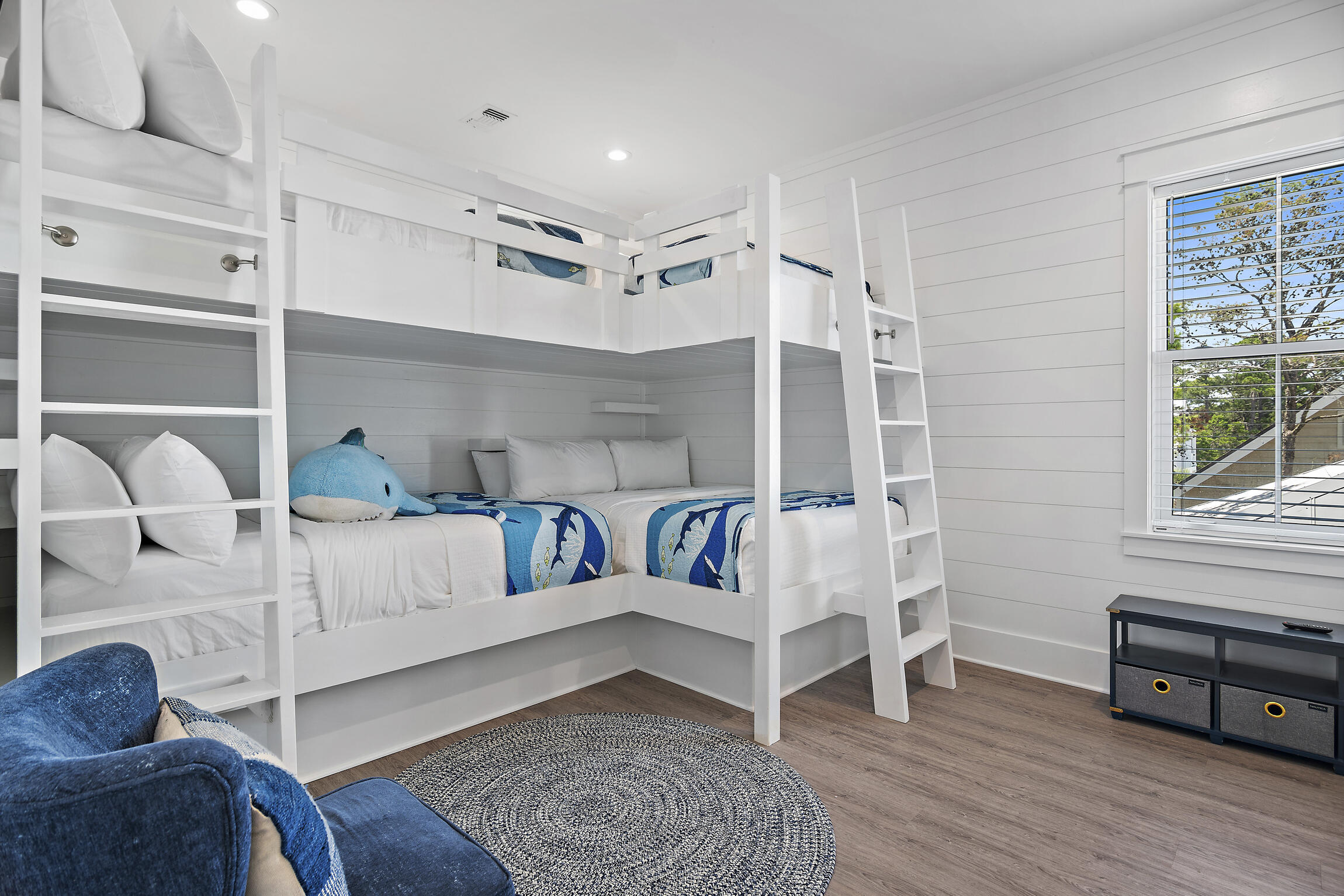 459 Dolphin Drive Santa Rosa Beach, FL 32459 - Photo 19 of 31 a bedroom with furniture and a wooden floor