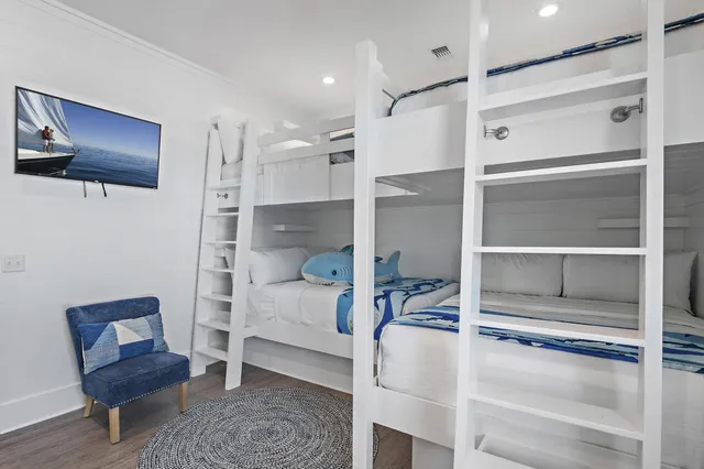 a room with a bed and furniture