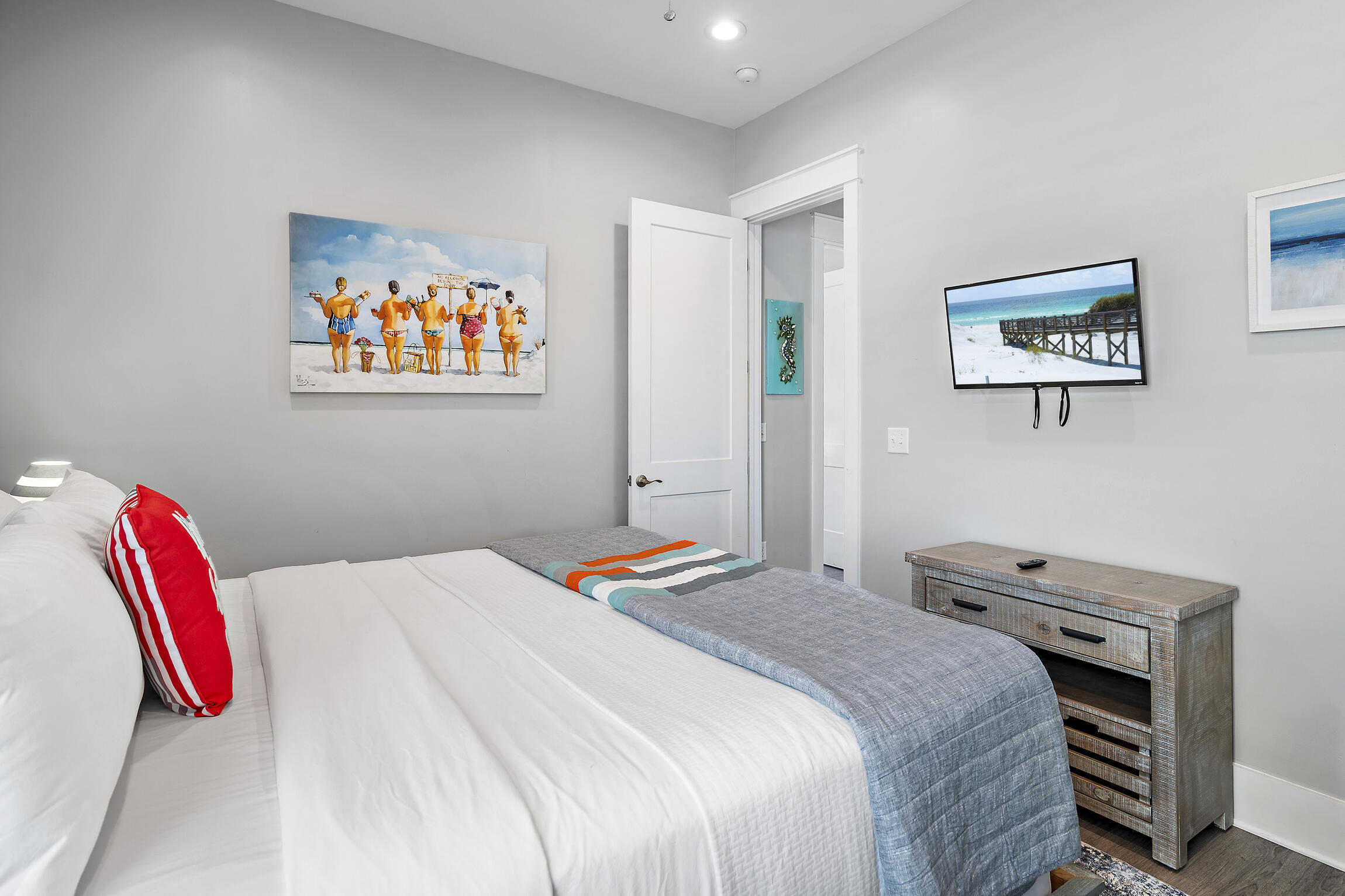 459 Dolphin Drive Santa Rosa Beach, FL 32459 - Photo 25 of 31 a bedroom with a bed and a painting on the wall