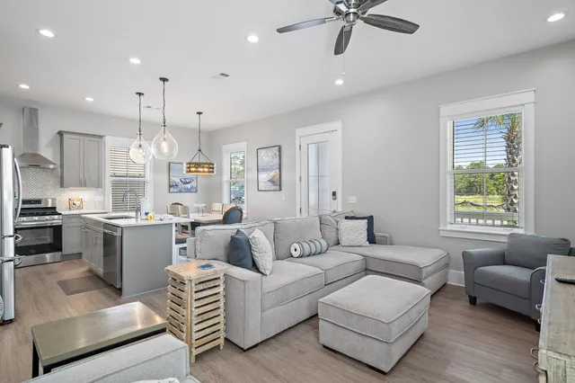a living room with furniture and a window