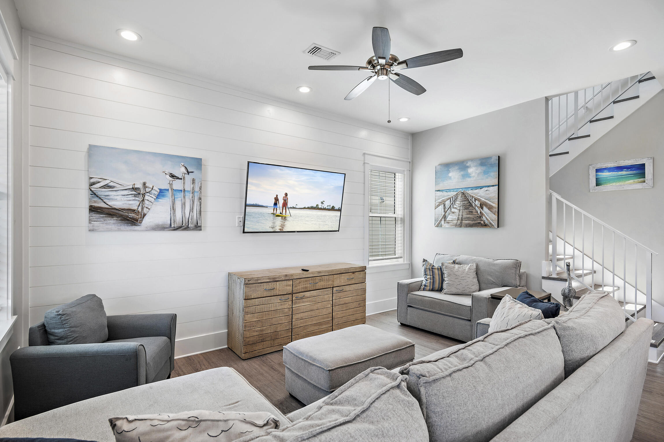 459 Dolphin Drive Santa Rosa Beach, FL 32459 - Photo 6 of 31 a living room with furniture and a ceiling fan