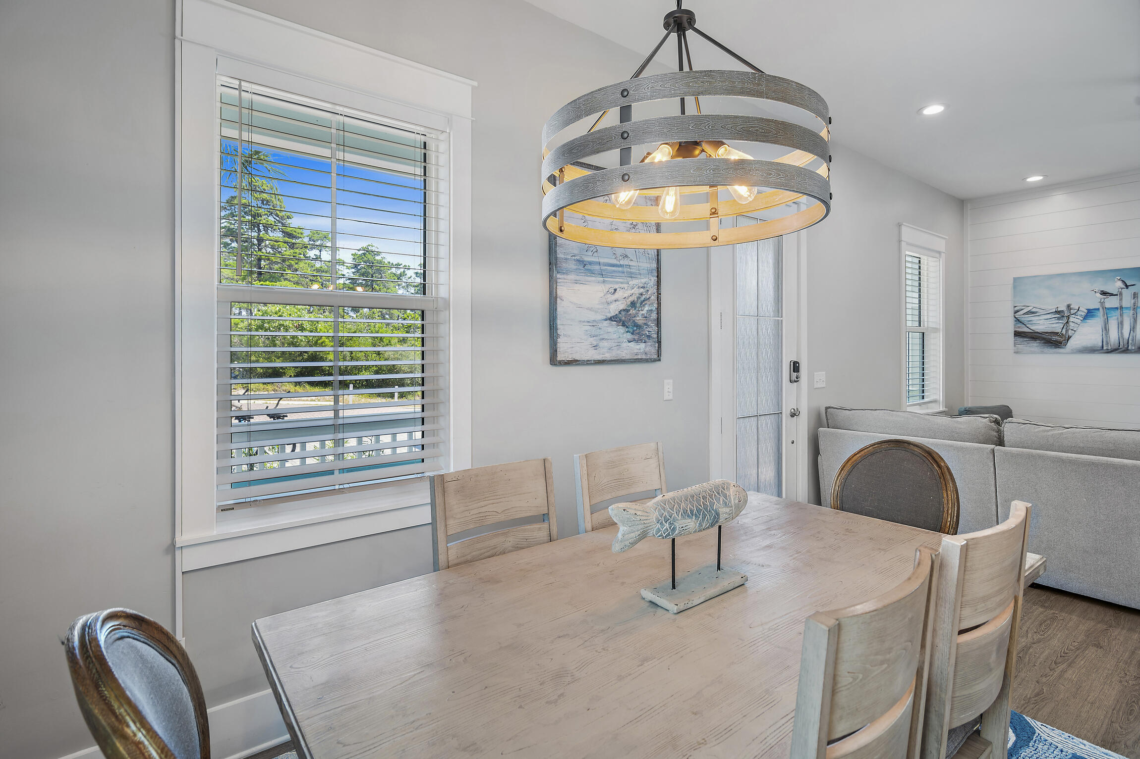 459 Dolphin Drive Santa Rosa Beach, FL 32459 - Photo 9 of 31 a bathroom with a granite countertop sink a mirror and a bathtub