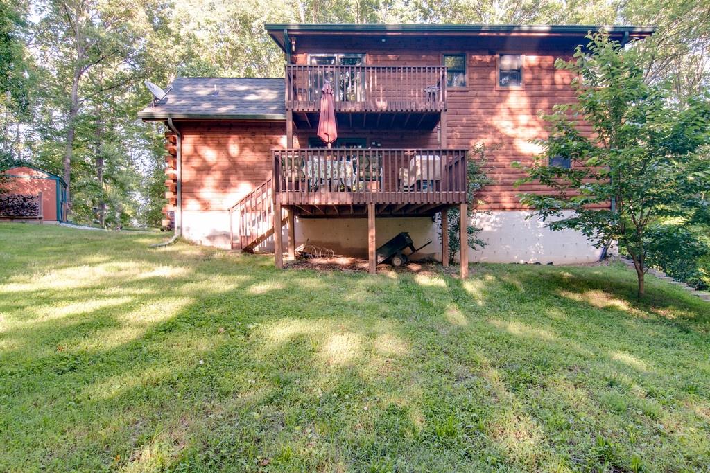 7085 Wells Cemetery Road Dickson, TN 37055 - Photo 19 of 24 a view of a house with a yard