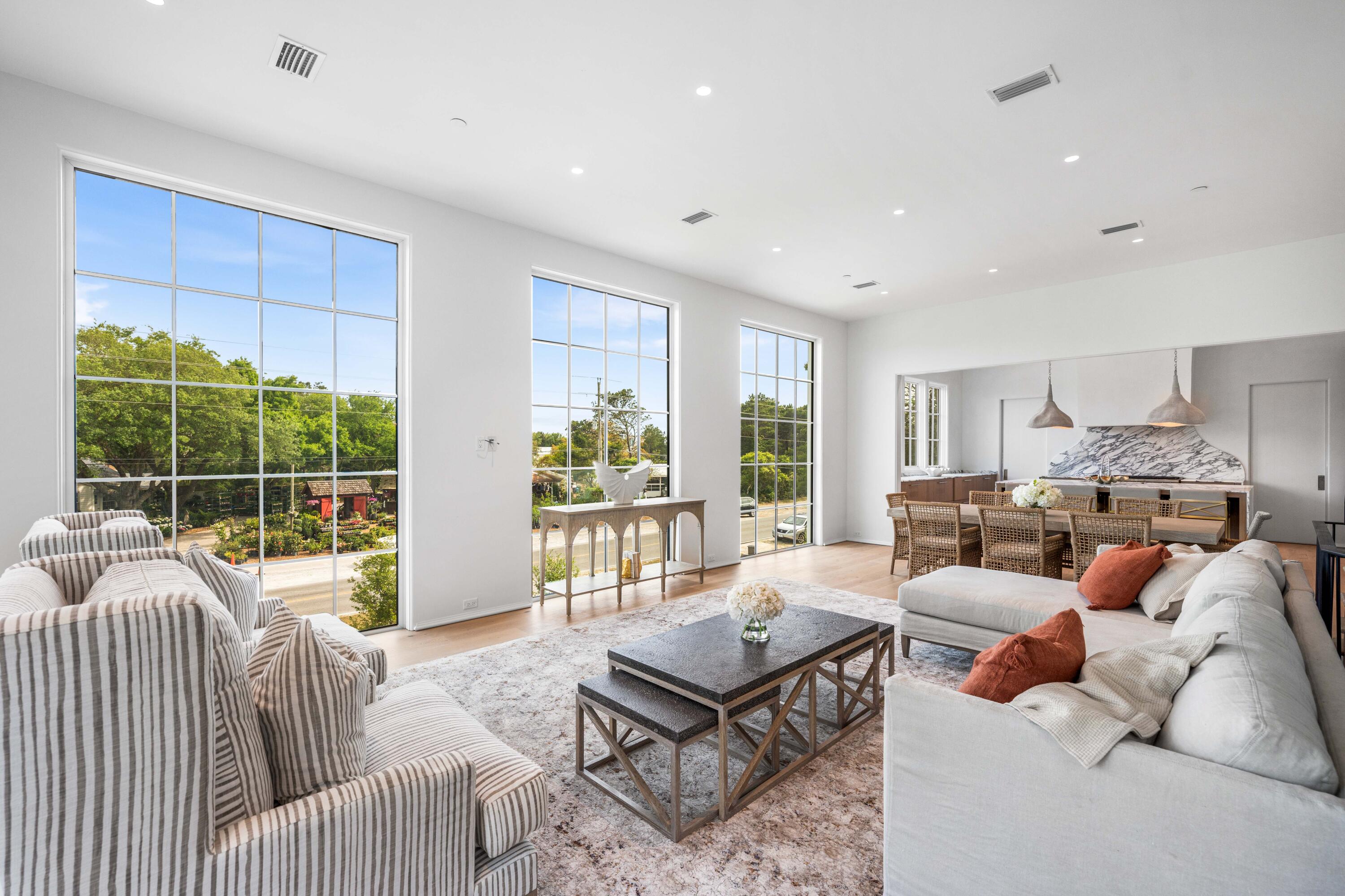 4655 East County Highway 30A Santa Rosa Beach, FL 32459 - Photo 11 of 69 a living room with furniture and a large window