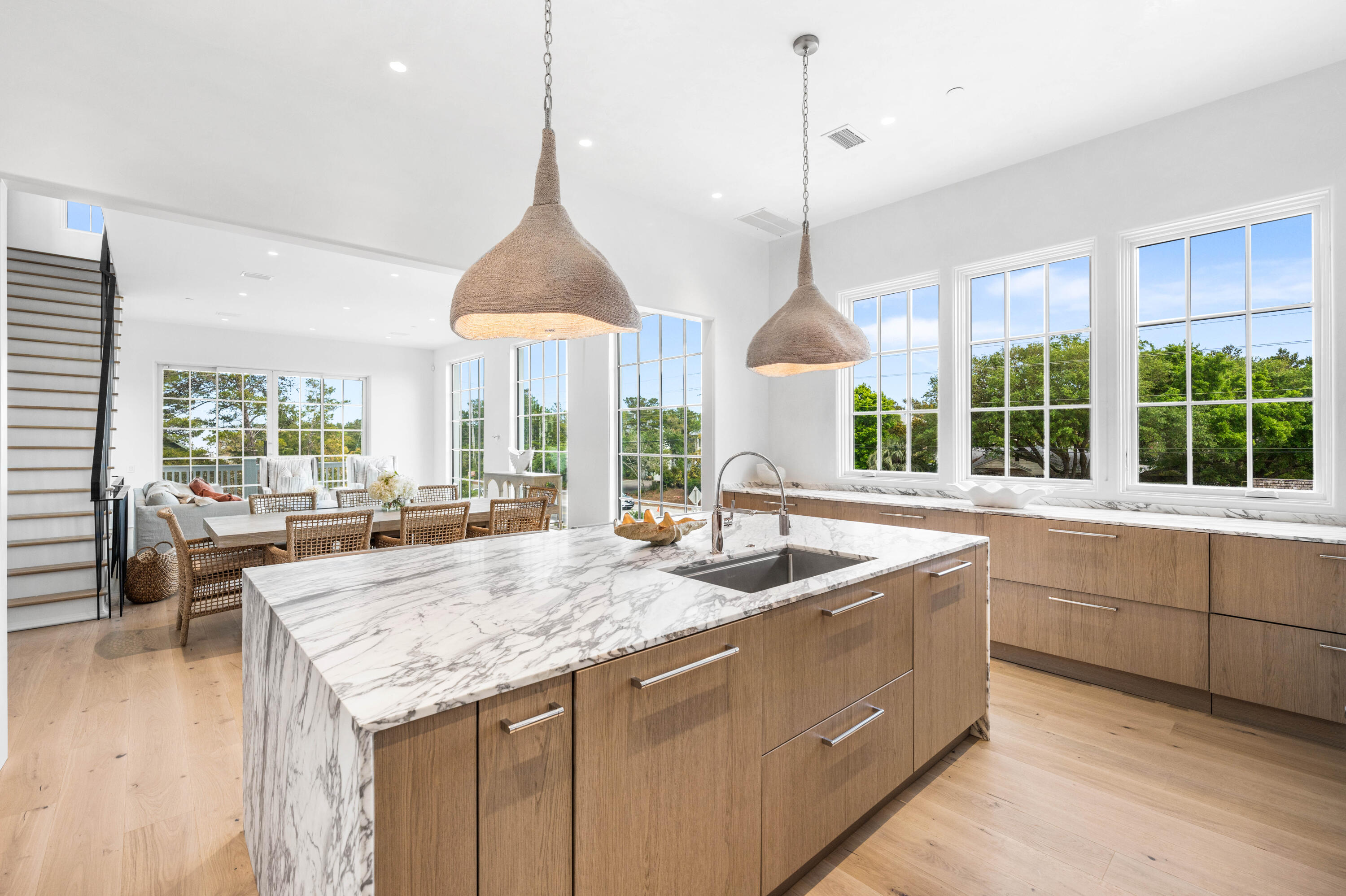 4655 East County Highway 30A Santa Rosa Beach, FL 32459 - Photo 21 of 69 a kitchen with center island table and chairs