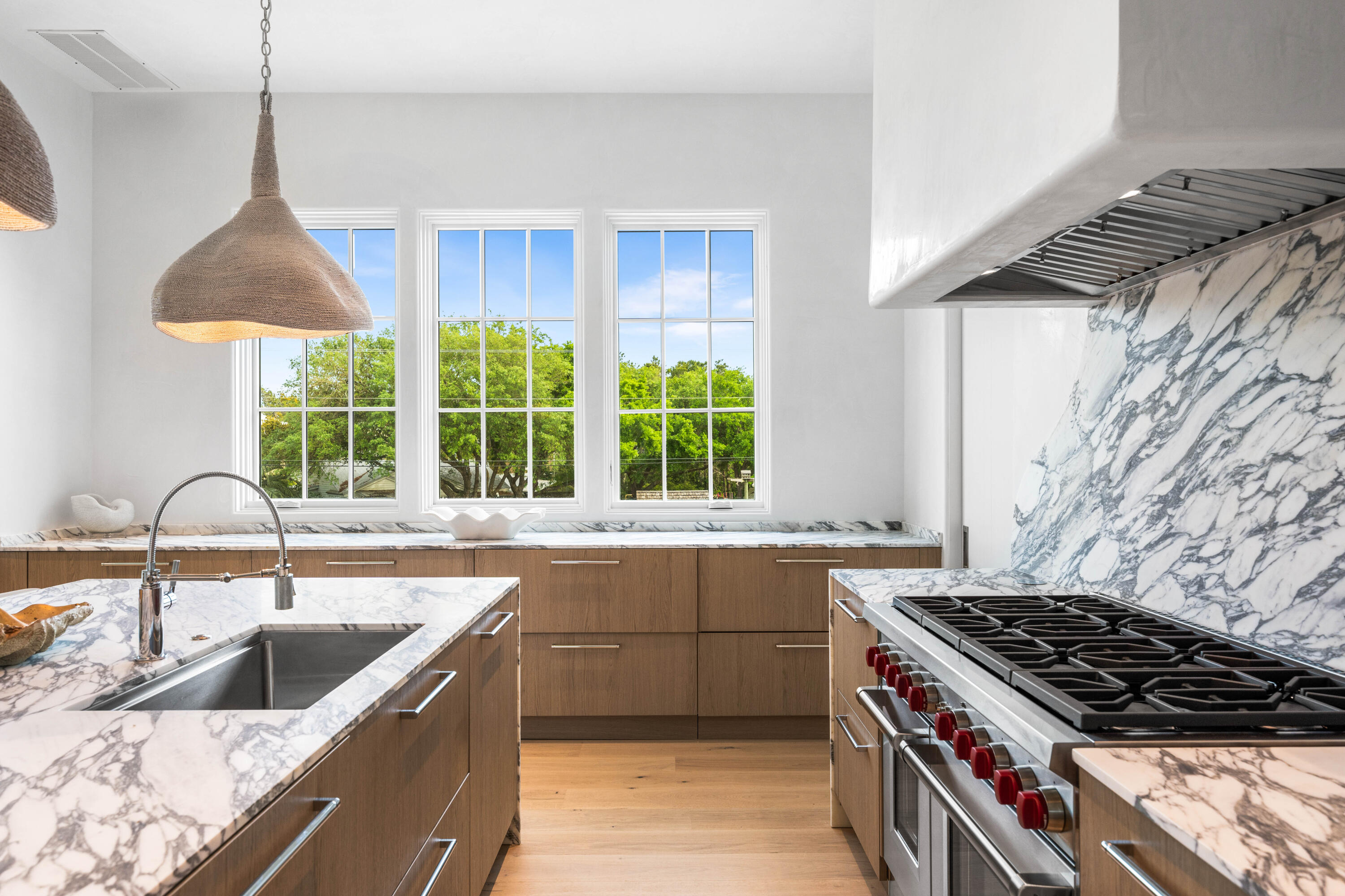 4655 East County Highway 30A Santa Rosa Beach, FL 32459 - Photo 25 of 69 a kitchen that has a sink and a stove