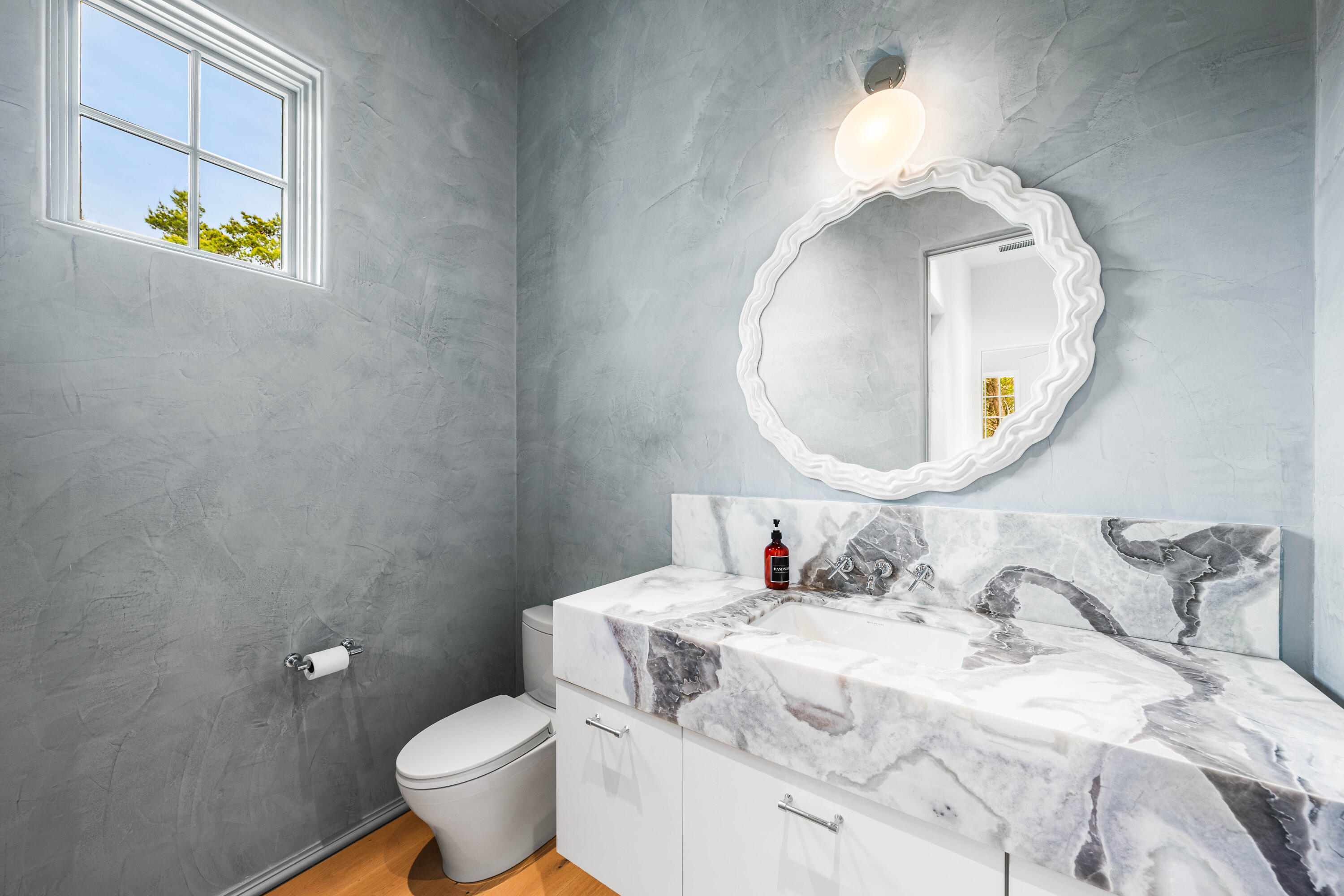 4655 East County Highway 30A Santa Rosa Beach, FL 32459 - Photo 28 of 69 a bathroom with a sink and a mirror