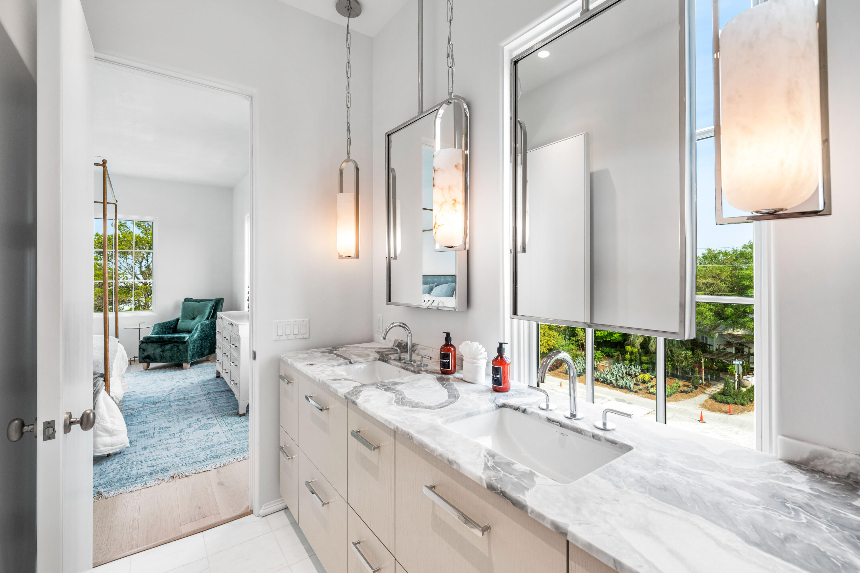 4655 East County Highway 30A Santa Rosa Beach, FL 32459 - Photo 33 of 69 a bathroom with a double vanity sink and a mirror