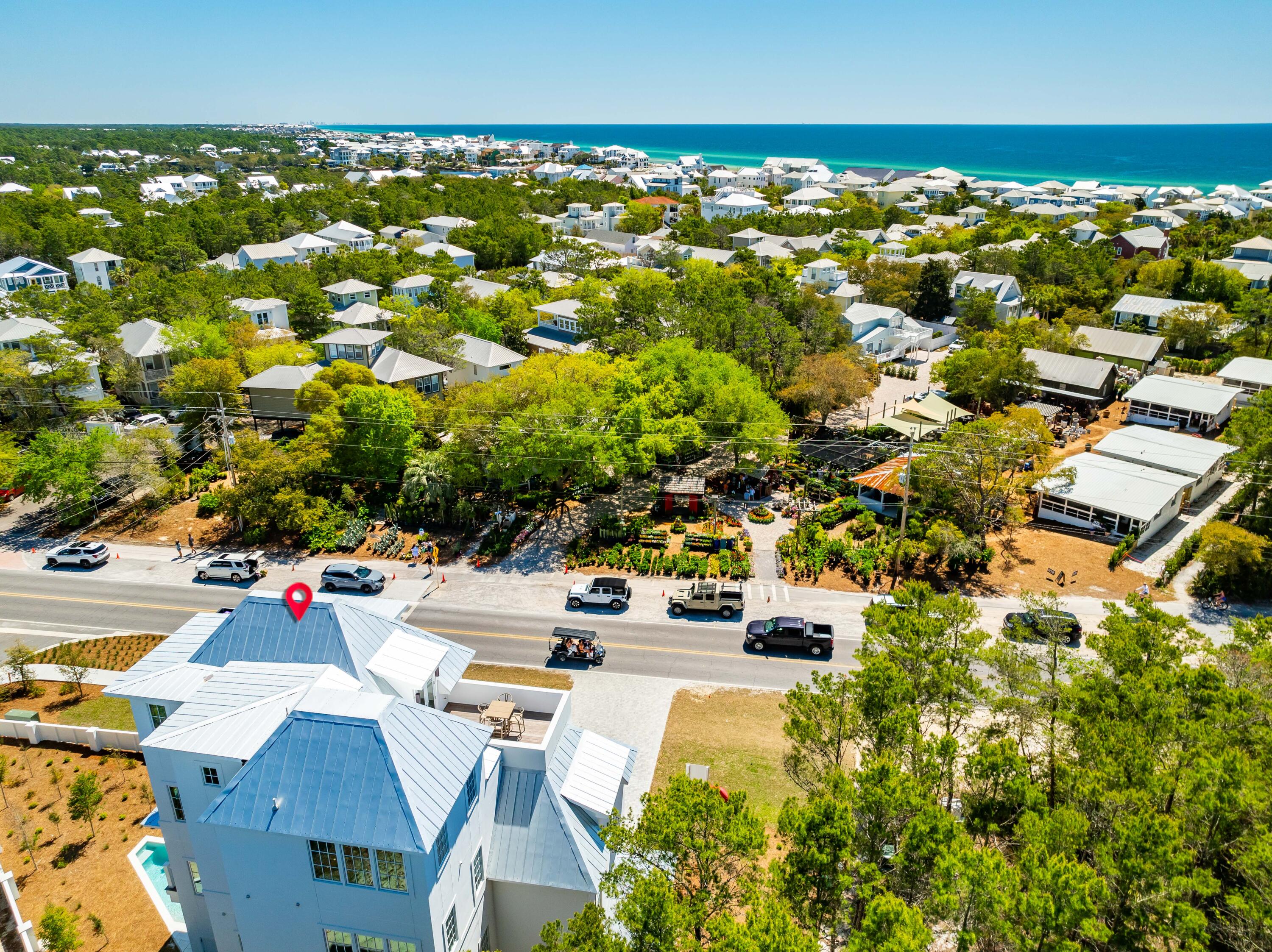 4655 East County Highway 30A Santa Rosa Beach, FL 32459 - Photo 66 of 69 an aerial view of residential houses with outdoor space and swimming pool