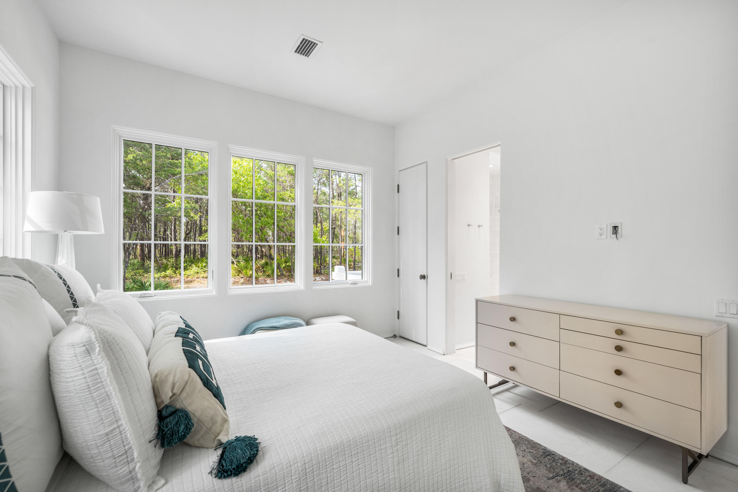 4655 East County Highway 30A Santa Rosa Beach, FL 32459 - Photo 9 of 69 a spacious bedroom with a bed and a window