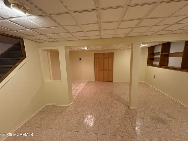 a view of hallway with a large window