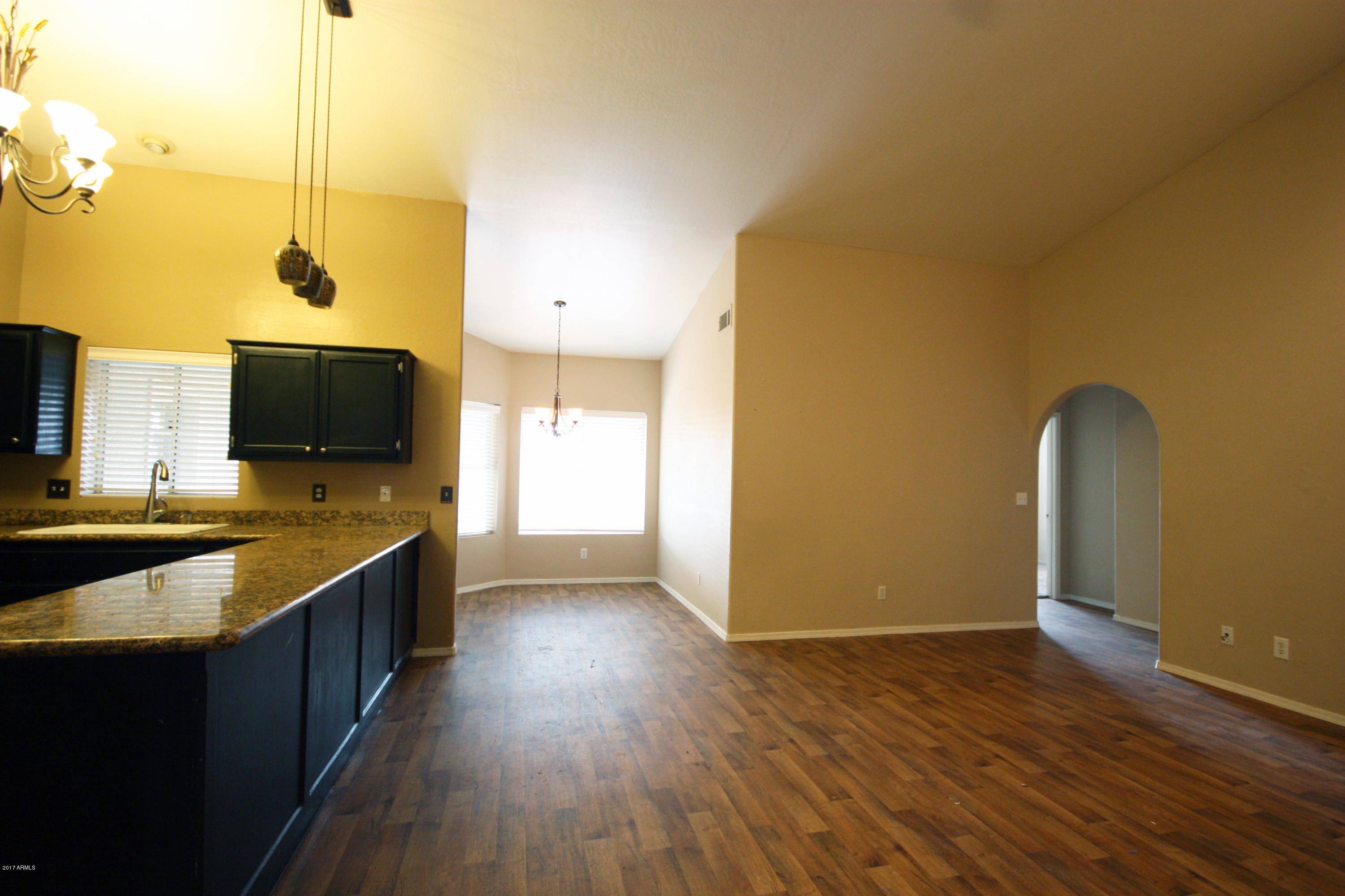 3905 East Decatur Street Mesa, AZ 85205 - Photo 4 of 15 04 - Family room - Kitchen - Breakfeast